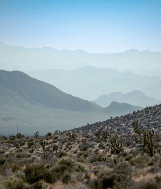 View between multiple desert mountain peaks